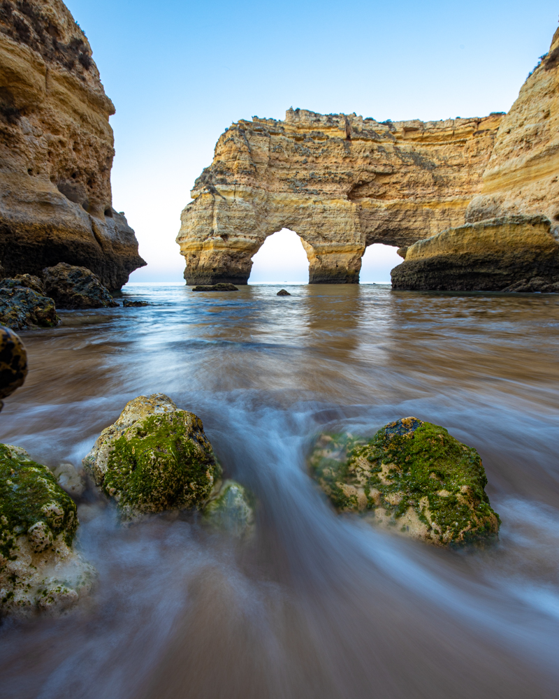 The arches at praia da marinha in the algarve. Rocks in the foreground.